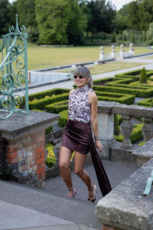 Truffle | E£5000 - mini skirt with a drapey sash