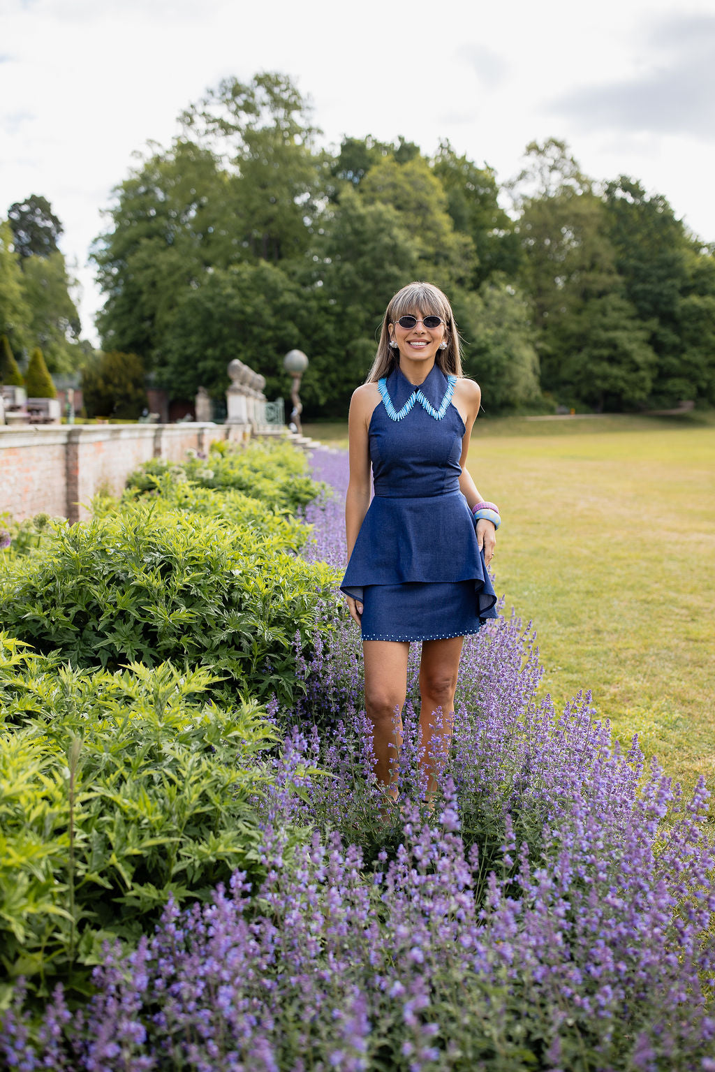 Holly Blue | E£7500 - a hand beaded backless peplum top and skirt set